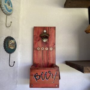 Abridor de botellas con colector de tapas.